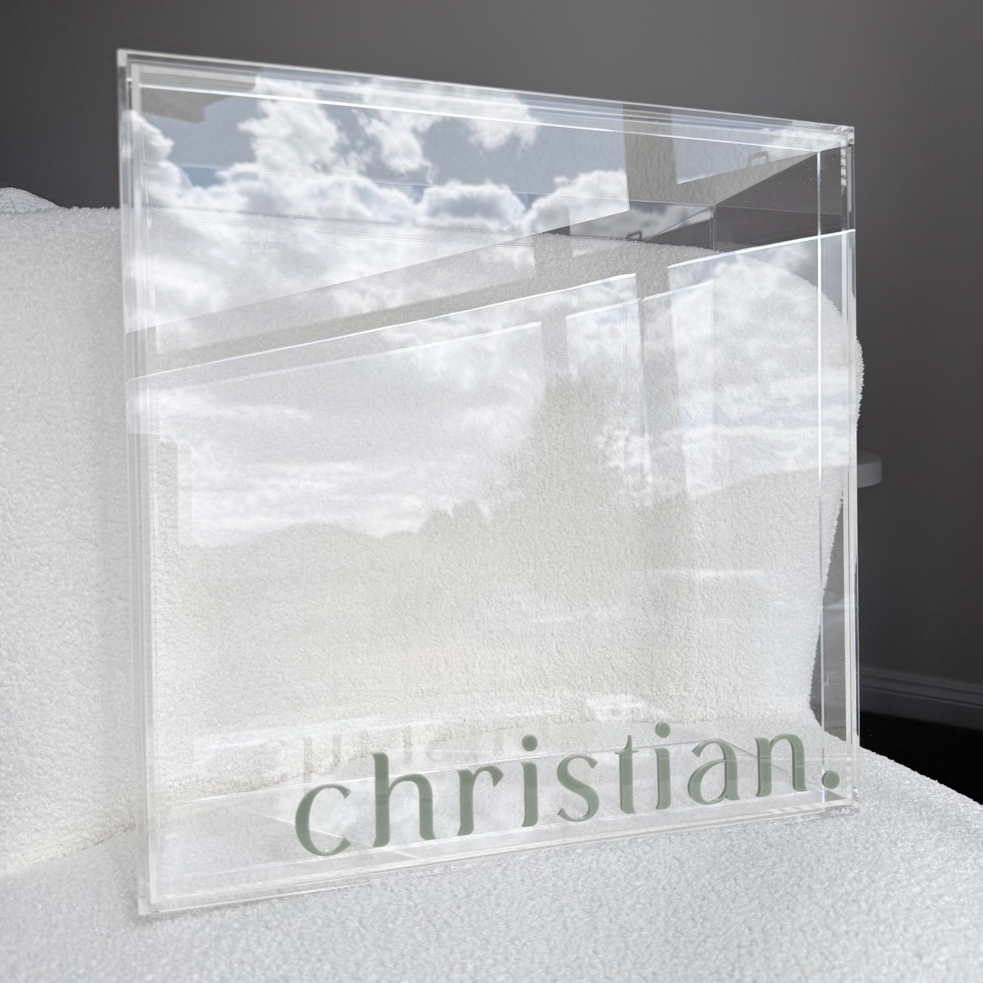 Clear acrylic block with 'christian' name on surface